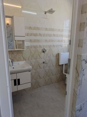 Bathroom in 1 BHK Builder Floor at Kalkaji – for Rent