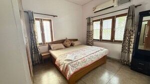 Bedroom in 3 BHK Builder Floor at Vasant Vihar – for Rent