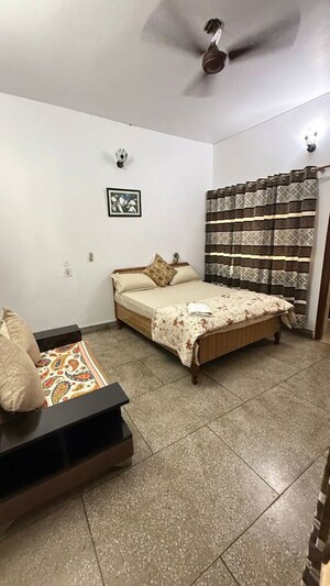 Bedroom in 3 BHK Builder Floor at Vasant Vihar – for Rent
