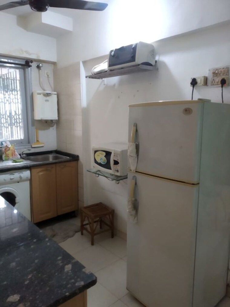 Kitchen, sea-gull 2 Bedroom 800 Sq.Ft. Apartment In Pali Hill Mumbai 10575113