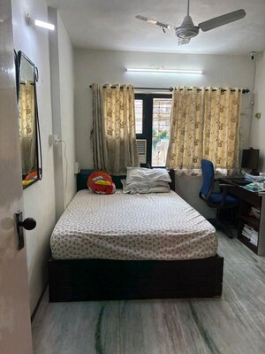 Bedroom in 2 BHK Apartment at Indradarshan II, Oshiwara – for Sale
