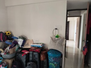 Living Room in 2 BHK Apartment at Kolte Patil Little Earth, Kiwale – for Rent