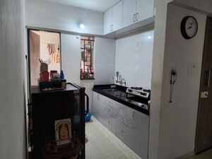 Kitchen in 2 BHK Apartment at Kolte Patil Little Earth, Kiwale – for Rent