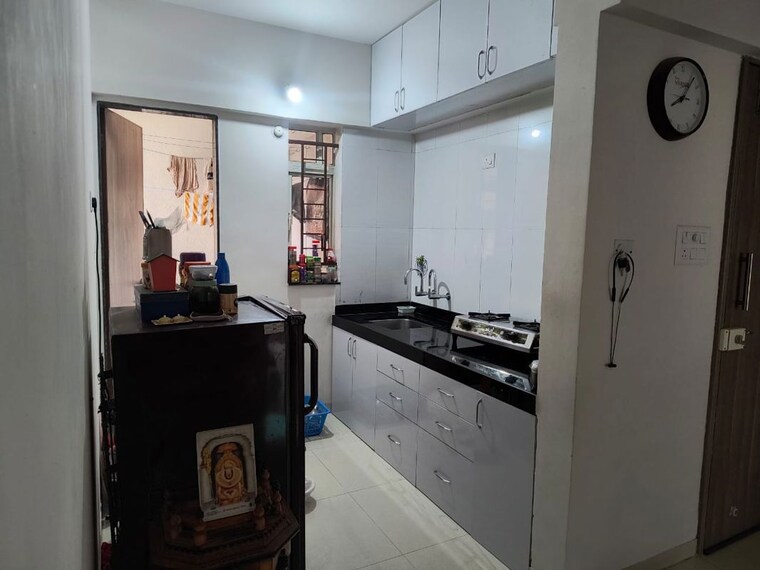 Kitchen, kolte-patil-little-earth 2 Bedroom 900 Sq.Ft. Apartment In Kiwale Pune 10575273