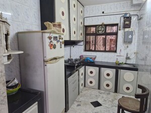 Kitchen in 1 BHK Apartment at Unique Tower, Sion – for Rent