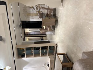 Living Room in 5 BHK Apartment at Ratan Khand – for Sale
