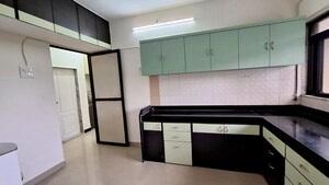 Kitchen in 2 BHK Apartment at Cosmos Heritage, Manpada – for Rent