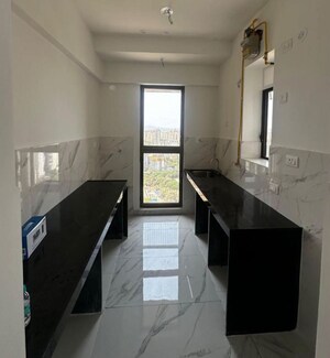 Kitchen in 2 BHK Apartment at Raymond Ten X Habitat, Pokhran Road No Two – for Rent