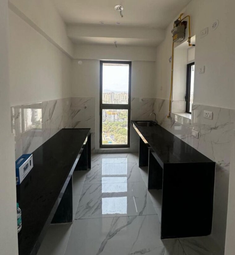 Kitchen, raymond-ten-x-habitat 2 Bedroom 700 Sq.Ft. Apartment In Pokhran Road No Two Thane 10575423
