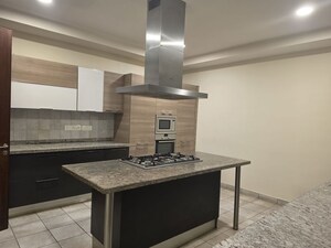 Kitchen in 4 BHK Apartment at Prestige White Meadows, Whitefield – for Sale