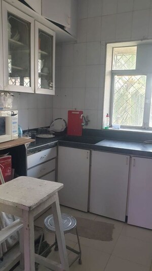 Kitchen in 2 BHK Apartment at Mukta Apartment 10th Main, Khar West – for Rent