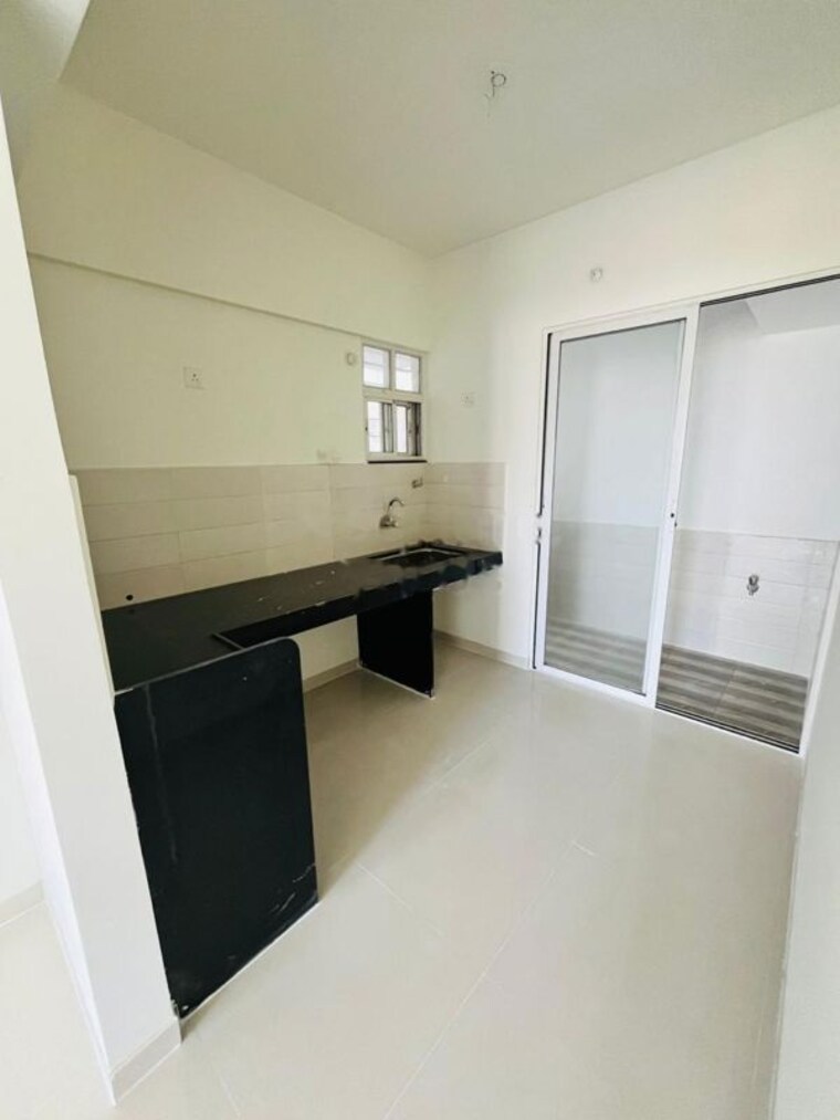 Kitchen, taha-trend 2 Bedroom 816 Sq.Ft. Apartment In Kondhwa Pune 10575497