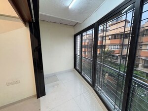 Room in 2 BHK Apartment at Dheeraj Plaza, Bandra West – for Rent