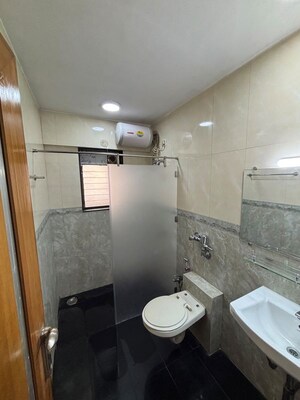Bathroom in 2 BHK Apartment at Dheeraj Plaza, Bandra West – for Rent