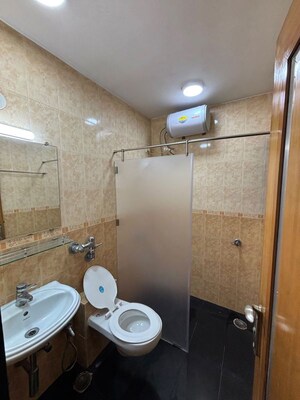 Bathroom in 2 BHK Apartment at Dheeraj Plaza, Bandra West – for Rent