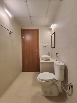 Bathroom in 2 BHK Apartment at Bhartiya Nikoo Homes Phase 2, Thanisandra Main Road – for Sale