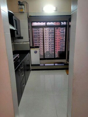 Kitchen in 2 BHK Apartment at Patel Heritage, Kharghar – for Rent
