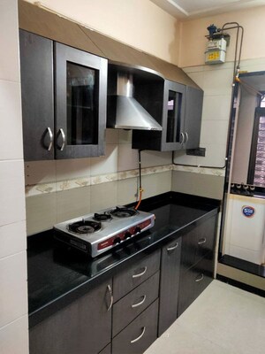 Kitchen in 2 BHK Apartment at Patel Heritage, Kharghar – for Rent