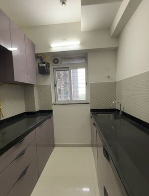 Kitchen in 1 BHK Apartment at Lodha Amara, Kolshet Road – for Rent