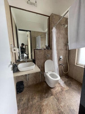 Bathroom in 2 BHK Apartment at Omkar Alta Monte, Malad East – for Rent