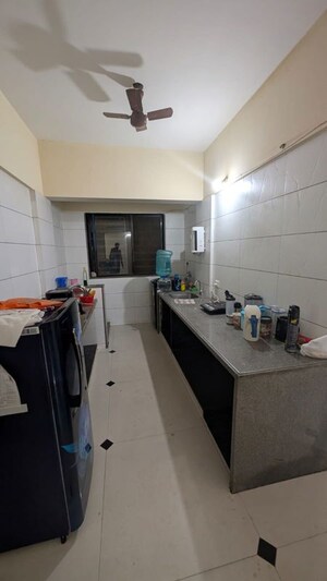 Kitchen in 2 BHK Apartment at Raheja Woods, Kalyani Nagar – for Rent