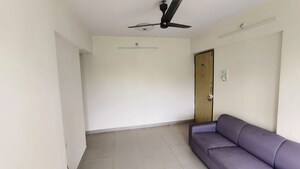 Living Room in 1 BHK Apartment at Ram Pushpanjali Residency, Owale – for Rent