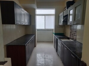 Kitchen in 3.5 BHK Apartment at Prateek Wisteria, Sector 77 – for Sale