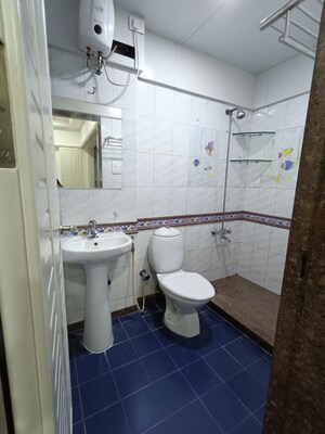 Bathroom in 4 BHK Apartment at Samartha Aangan, Andheri West – for Sale