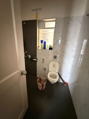 Bathroom in 3 BHK Apartment at Vijay Nakshatra, Ghodbunder Road – for Rent