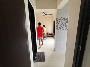 Bathroom in 1 BHK Apartment at Unnati Woods CHS, Kasarvadavali – for Rent