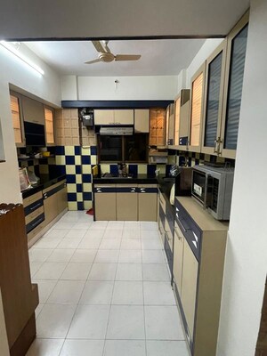 Kitchen in 2 BHK Apartment at Sudarshan Sky Garden, Ghodbunder Road – for Rent