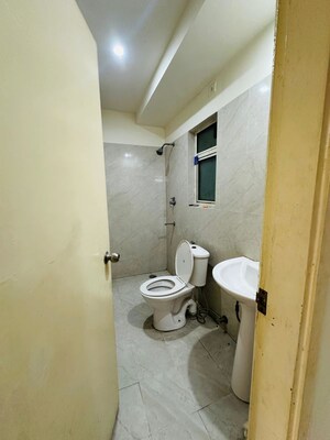 Bathroom in 3.5 BHK Builder Floor at Puri Aman Vilas, Sector 89 – for Rent