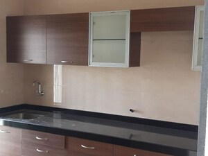 Kitchen in 2 BHK Apartment at Puranik Hometown, Ghodbunder Road – for Rent