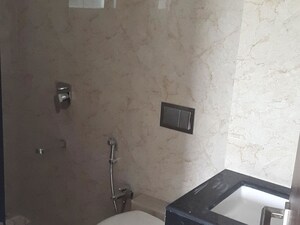 Bathroom in 2 BHK Apartment at Puranik Hometown, Ghodbunder Road – for Rent