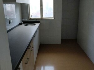 Kitchen in 1.5 BHK Apartment at Squarefeet Grand Square, Anand Nagar – for Rent