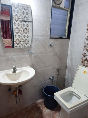 Bathroom in 2 BHK Apartment at Magarpatta City Roystonea, Hadapsar – for Rent