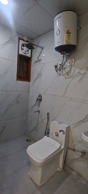 Bathroom in 2 BHK Builder Floor at Chattarpur – for Sale