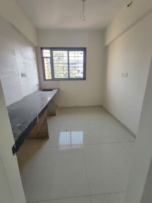 Kitchen in 2 BHK Apartment at Nagpal Sudarshan Paradise, Pimple Nilakh – for Rent