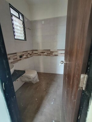 Bathroom in 2 BHK Apartment at Nagpal Sudarshan Paradise, Pimple Nilakh – for Rent
