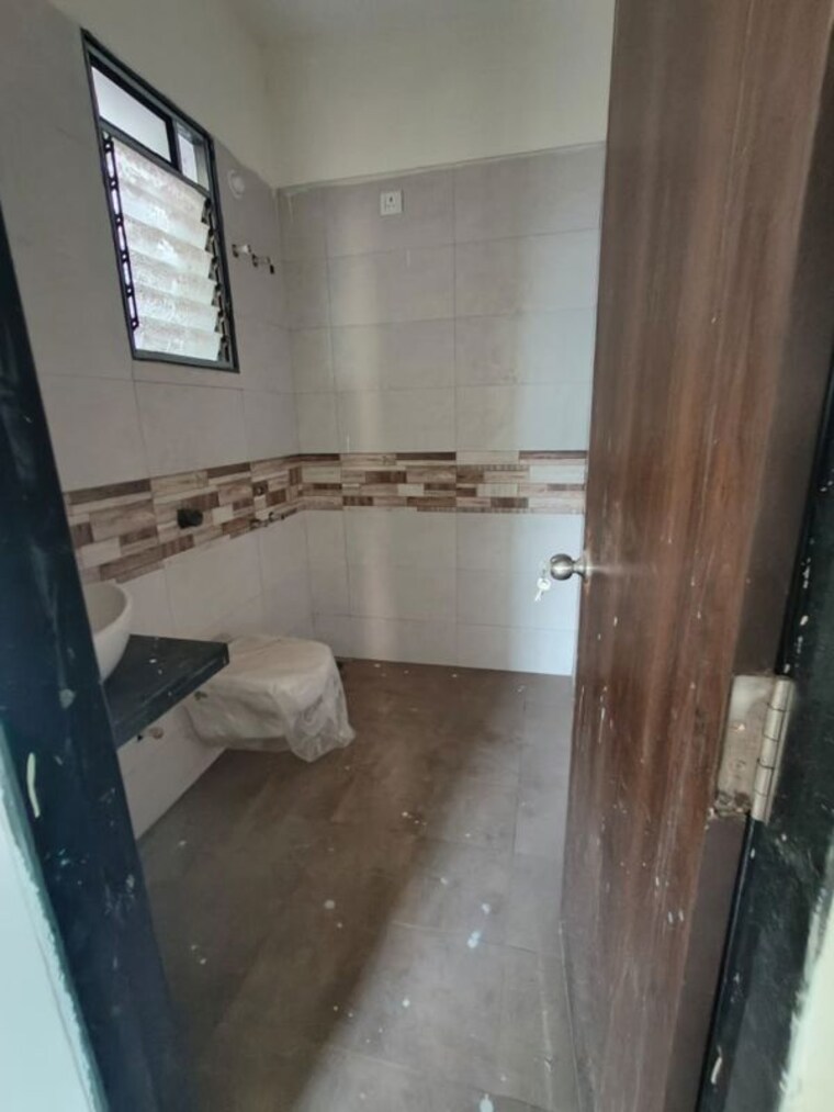 Bathroom, nagpal-sudarshan-paradise 2 Bedroom 1090 Sq.Ft. Apartment In Pimple Nilakh Pune 10543154