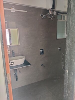 Bathroom in 1.5 BHK Apartment at Deraiya Luxurio, Kurla – for Rent