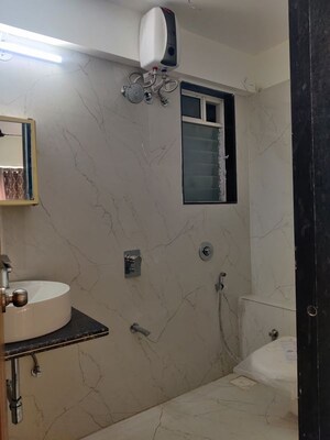 Bathroom in 1.5 BHK Apartment at Deraiya Luxurio, Kurla – for Rent