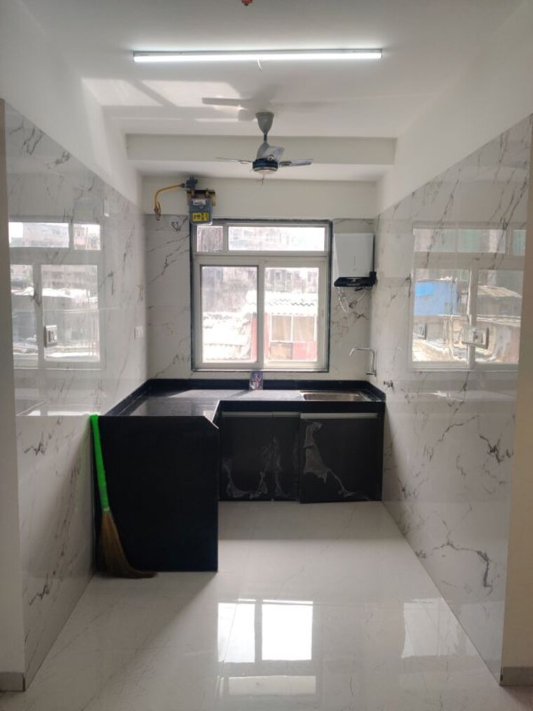 Kitchen, deraiya-luxurio 1.5 Bedroom 450 Sq.Ft. Apartment In Kurla Mumbai 10576219