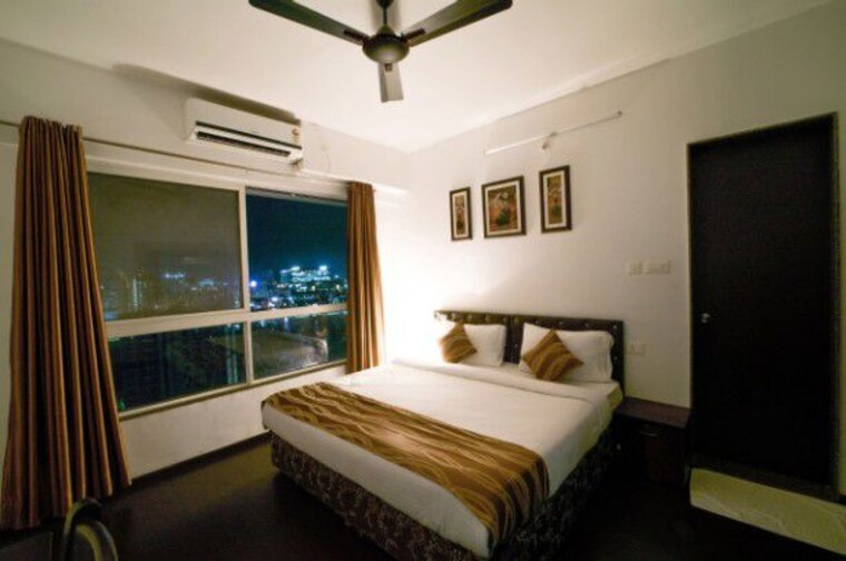 Bedroom, magarpatta-city-roystonea 3 Bedroom 1650 Sq.Ft. Apartment In Hadapsar Pune 10576234