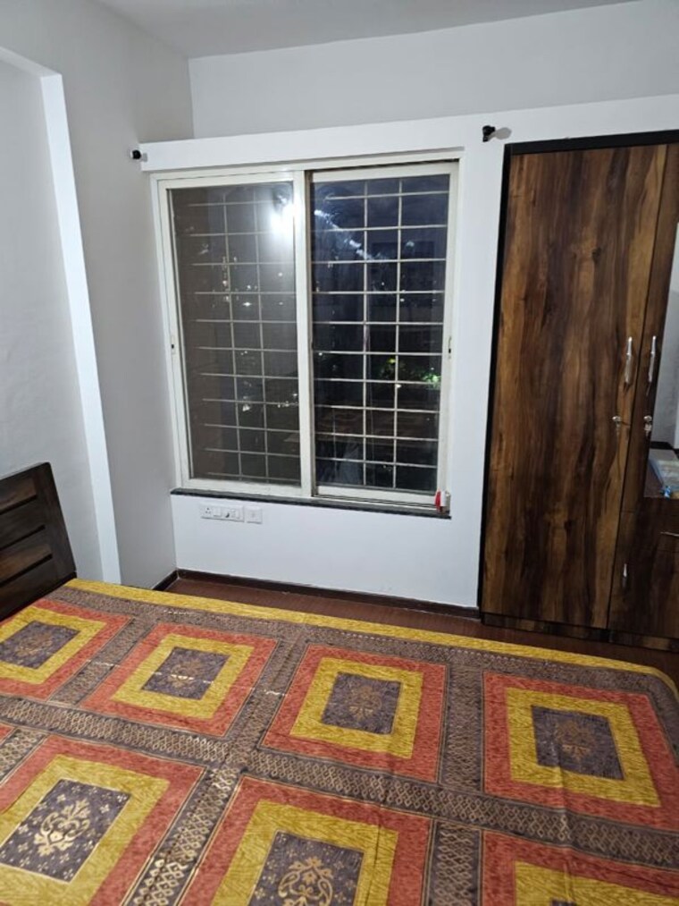 Bedroom, magarpatta-city-iris 2 Bedroom 1080 Sq.Ft. Apartment In Hadapsar Pune 10576247
