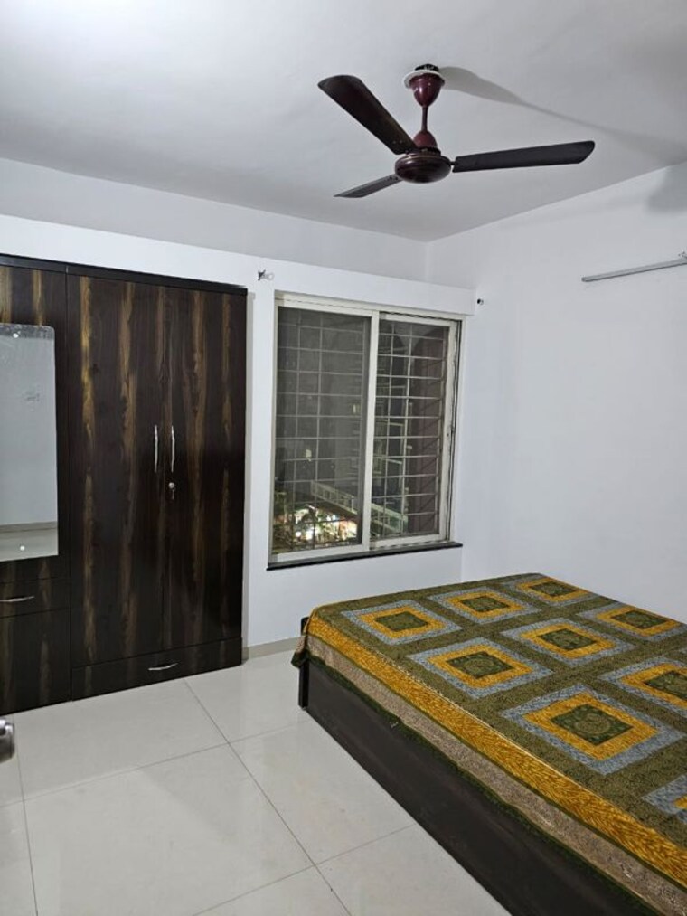 Bedroom, magarpatta-city-iris 2 Bedroom 1080 Sq.Ft. Apartment In Hadapsar Pune 10576247
