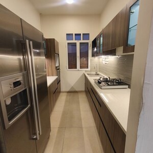 Kitchen in 3 BHK Apartment at Omkar Alta Monte, Malad East – for Rent