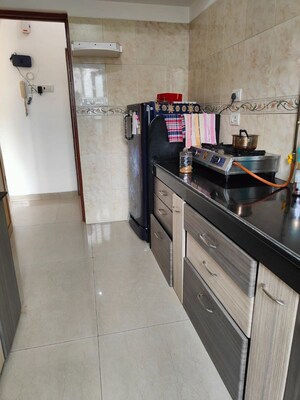 Kitchen in 2 BHK Apartment at K Raheja Heights, Malad East – for Rent