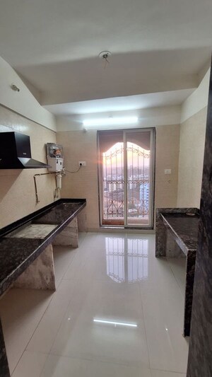 Kitchen in 1.5 BHK Apartment at Tharwani Meghna Montana, Ambernath West – for Rent