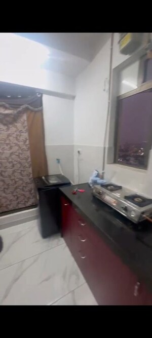 Kitchen in 1 BHK Apartment at Raymond Ten X Habitat, Pokhran Road No Two – for Rent